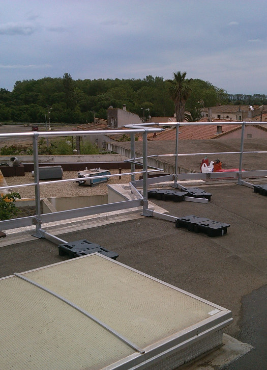 Pose de garde corps en toiture terrasse