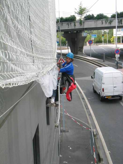 Pose de filets de protection en hauteur