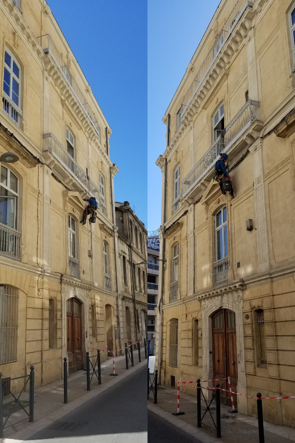 Création d'un carottage sur la façade de cet immeuble à Montpellier pour mettre en place un raccordement électrique 
